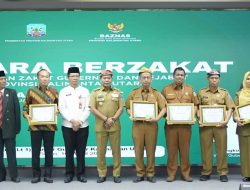 Gubernur Zainal bersama ASN Salurkan Zakat Melalui Baznas 